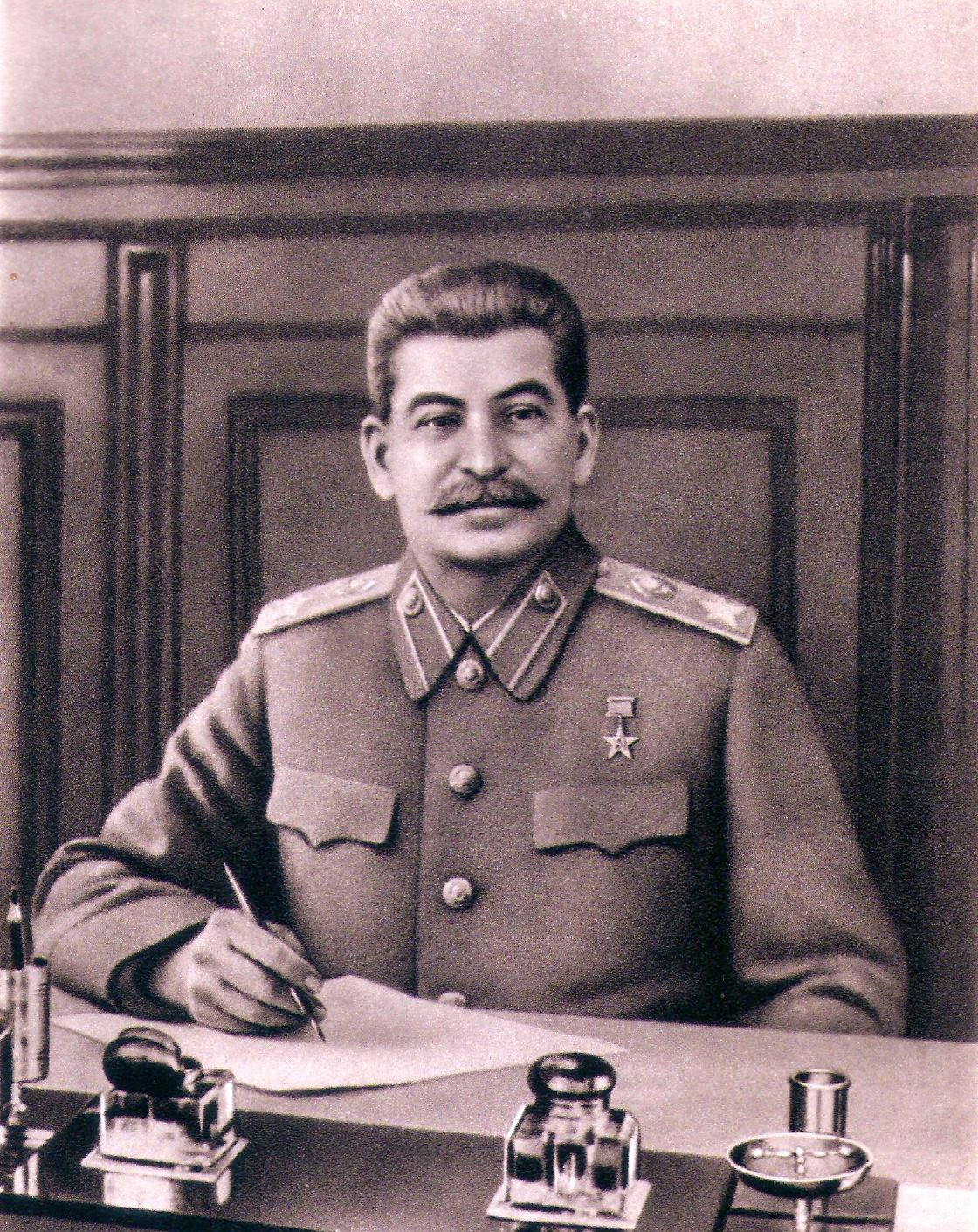 Joseph Stalin (1878-1953) sitting in his office. This man lead the soviets through the second World War; and would be responsible for 20 million deaths from his labor camps and food shortages.